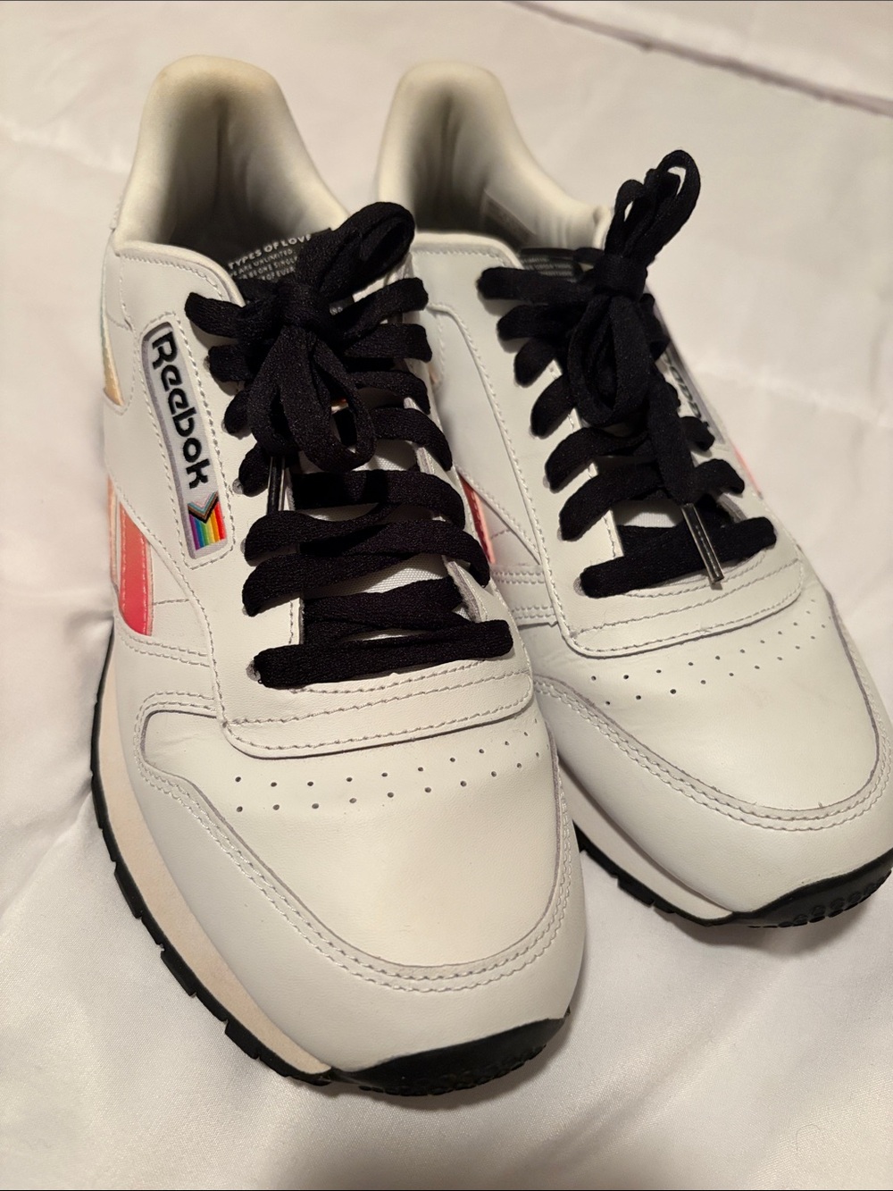Reebok Woman’s White Sneakers with rainbow  Accent